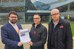 Roger Tester and Matt Hartley handing in the Save Coldharbour Police Base petition with Thomas Turrell AM