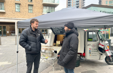 Charlie Davis speaks to Kidbrooke Village traders