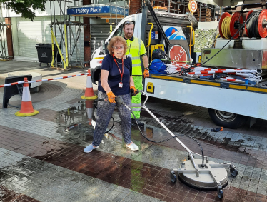 Councillor Pat Greenwell pavement jet-washing Eltham High Street